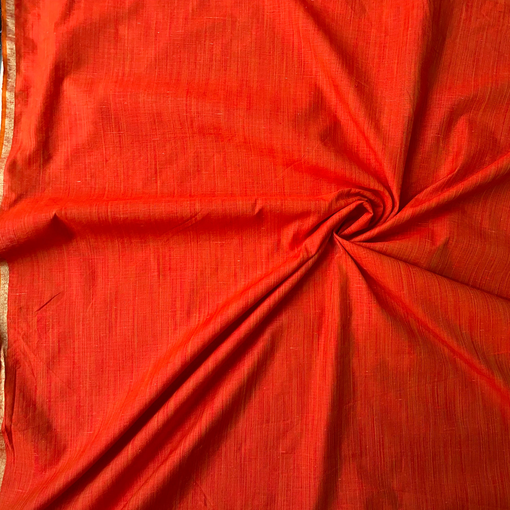orange colour cotton fabric with zari border