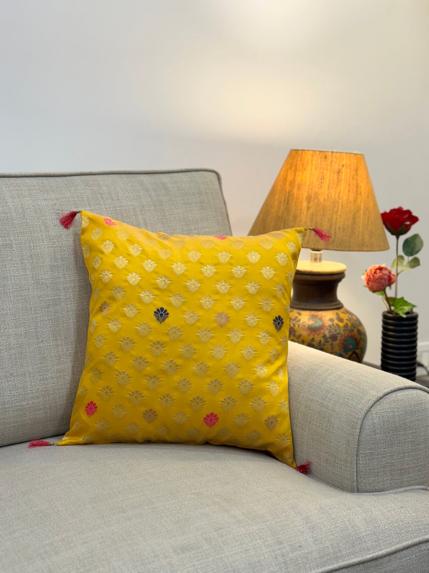 yellow brocade cushion cover with golden thread work