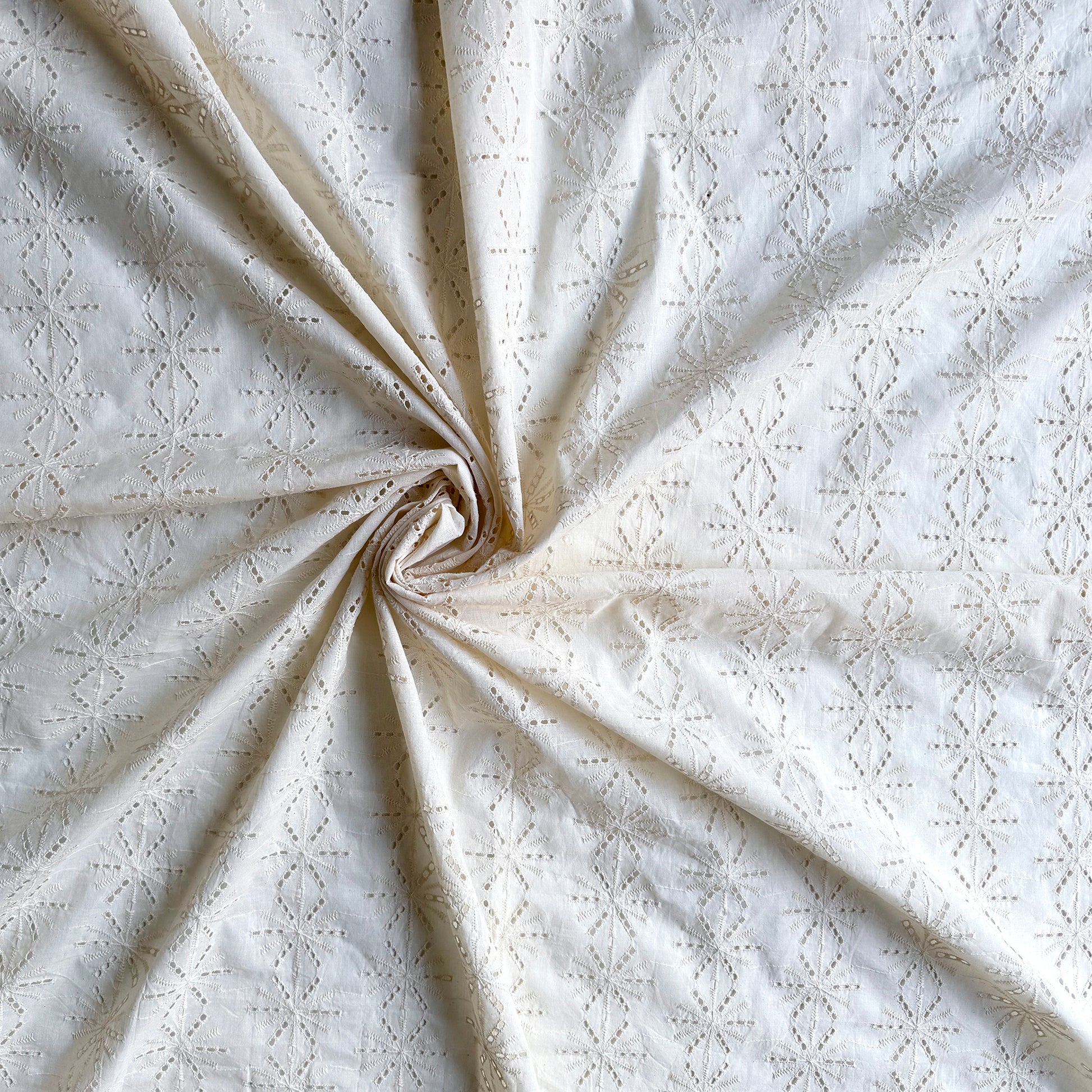white cotton hakoba fabric with holes