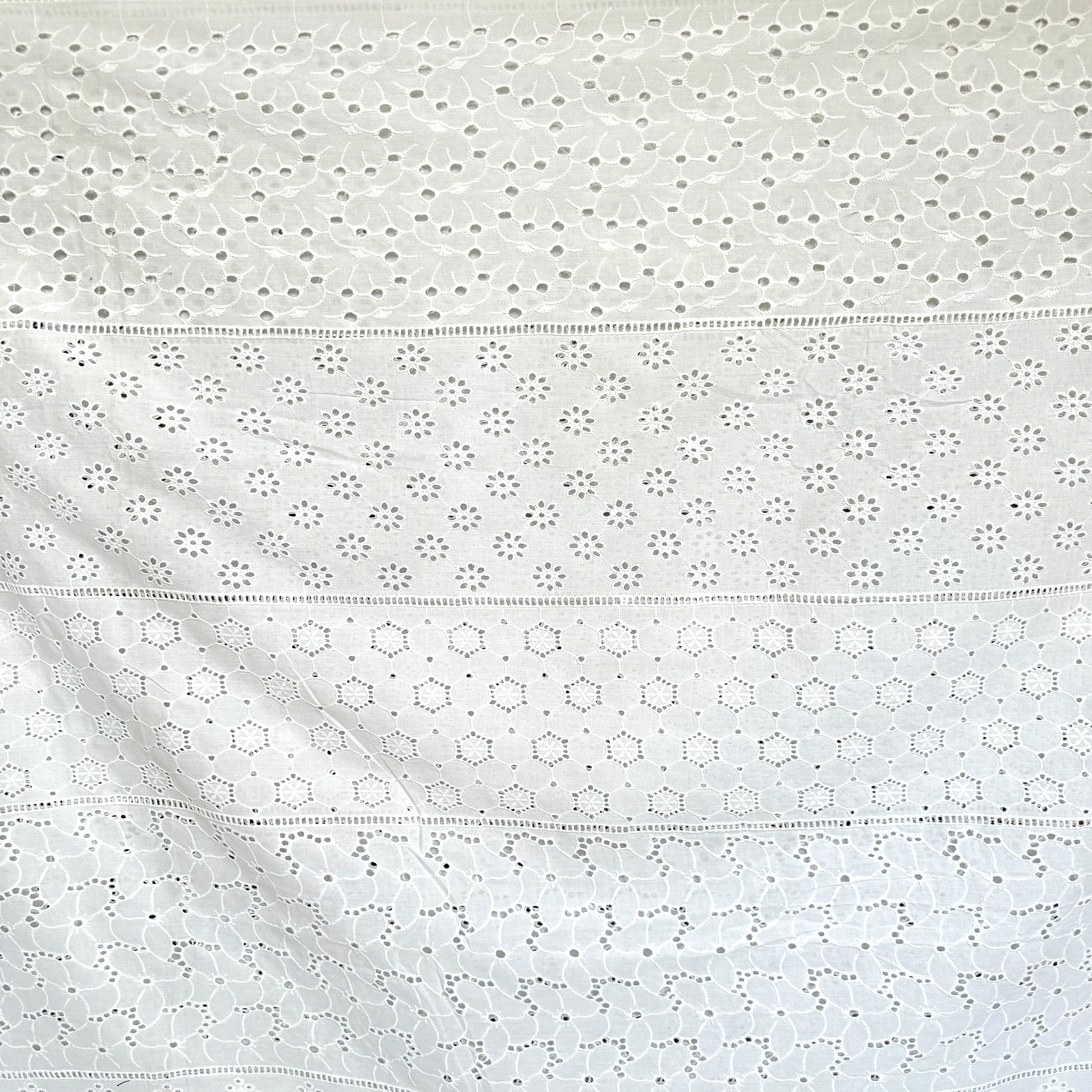 white cotton hakoba fabric with holes