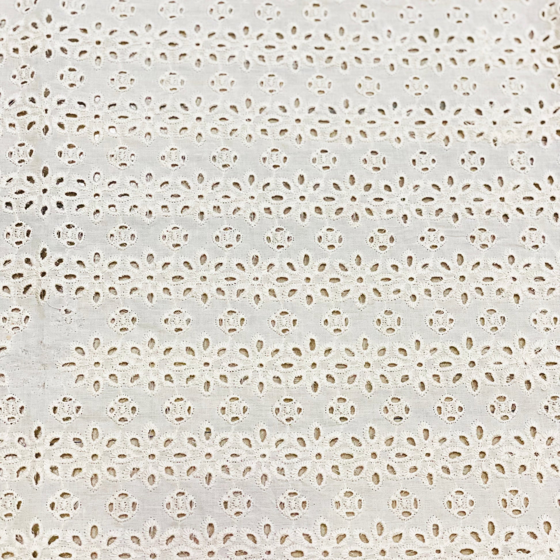 beige-flower-cut-work-schiffli-fabric-online