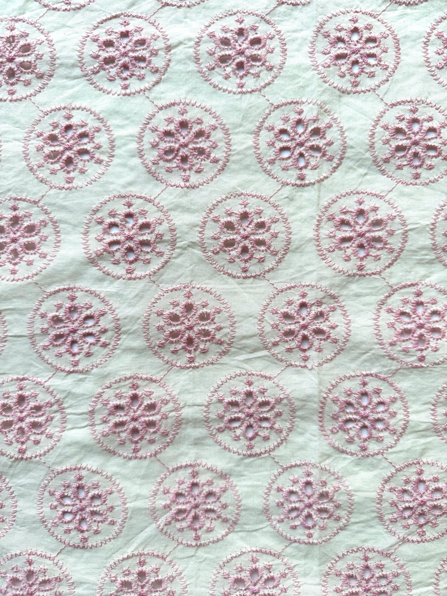 pink hakoba fabric with holes