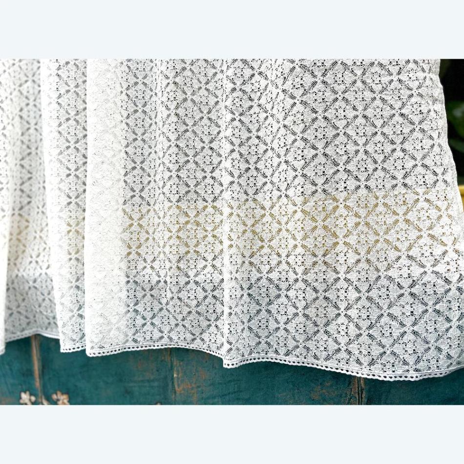white semi sheer window and door curtains