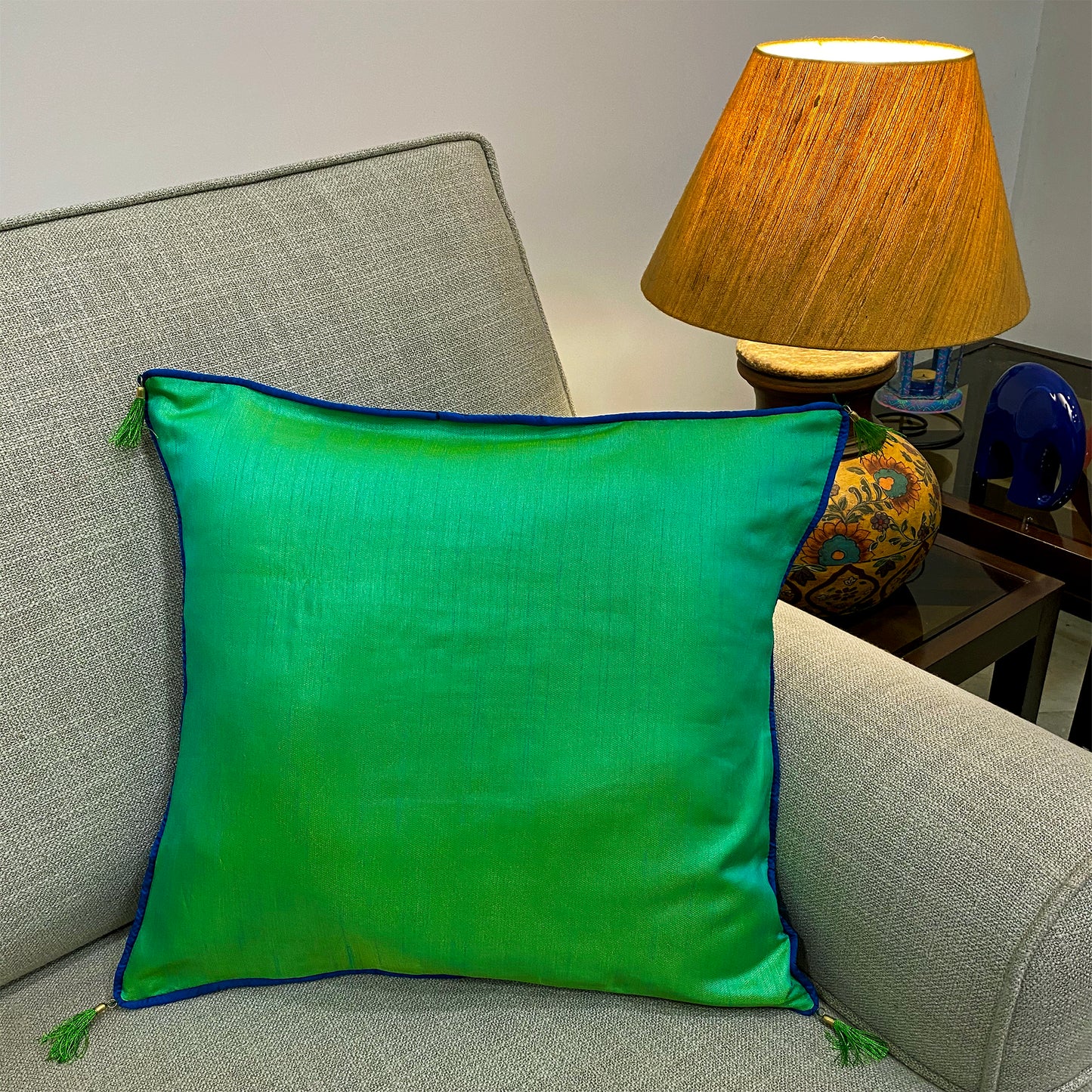 emerald green silk cushion cover with royal blue piping