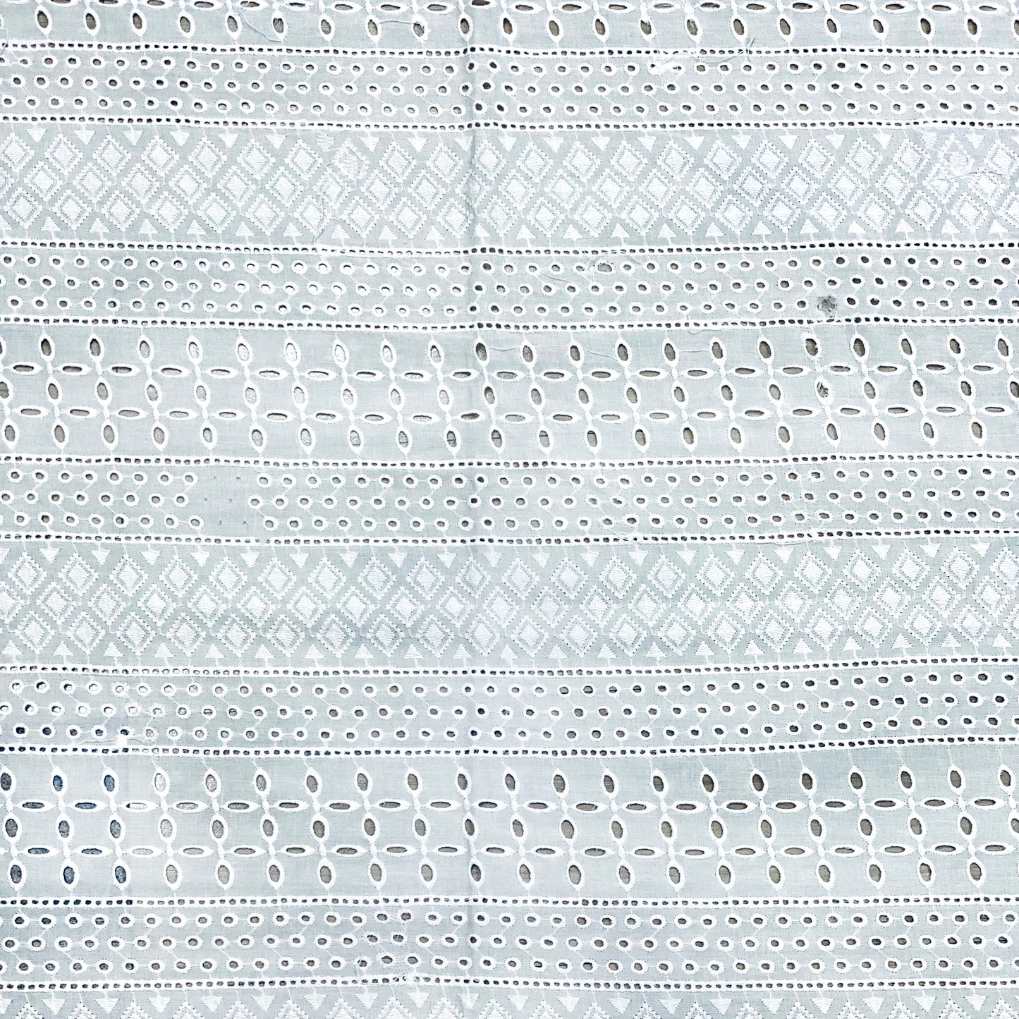 hakoba-eyelet-chikan-fabric-in-white