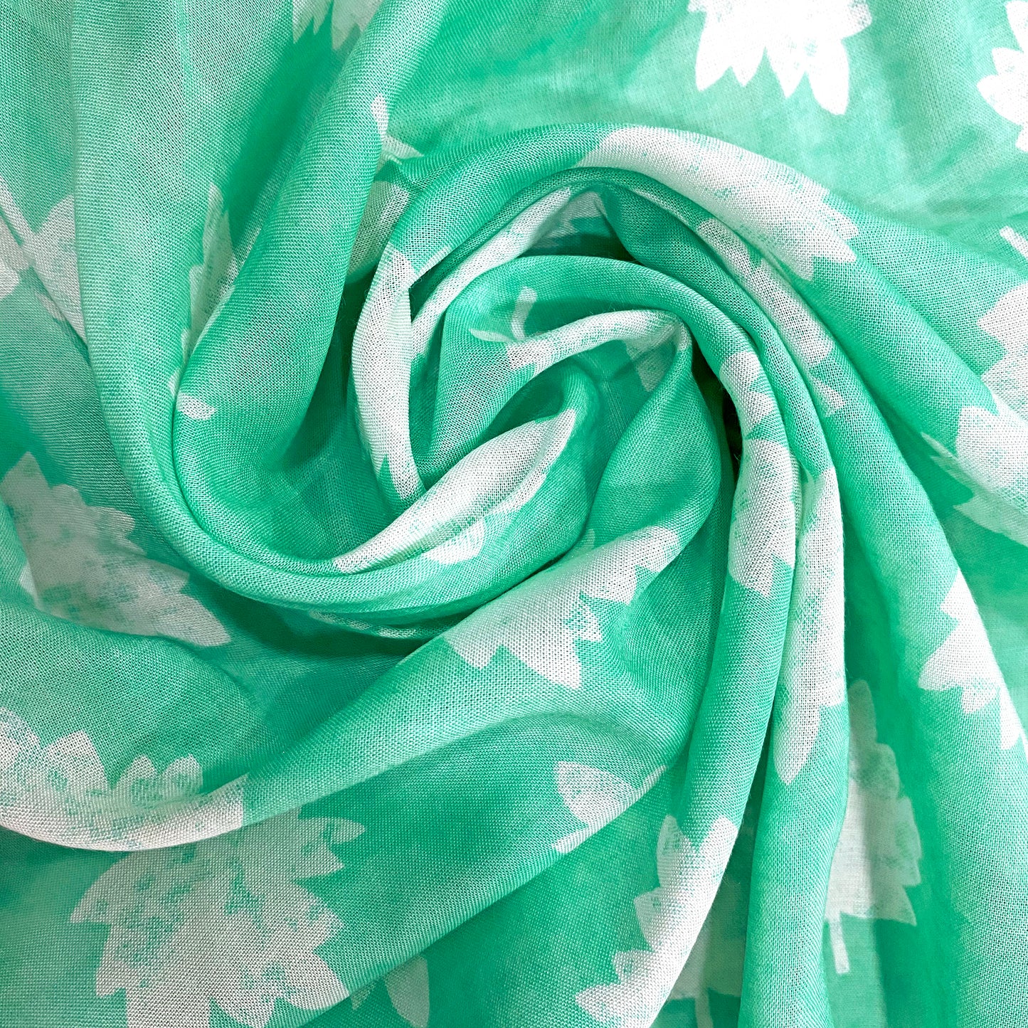 maple-leaf-print-on-aquamarine-cotton-fabric