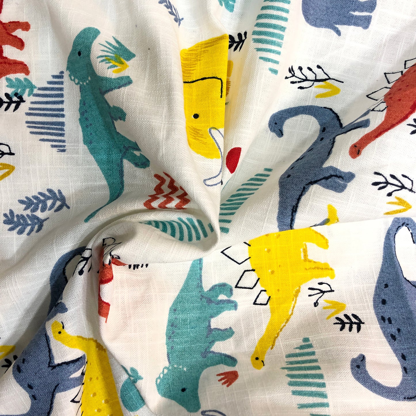 thin-cotton-fabric-in-dinosaur-print-online