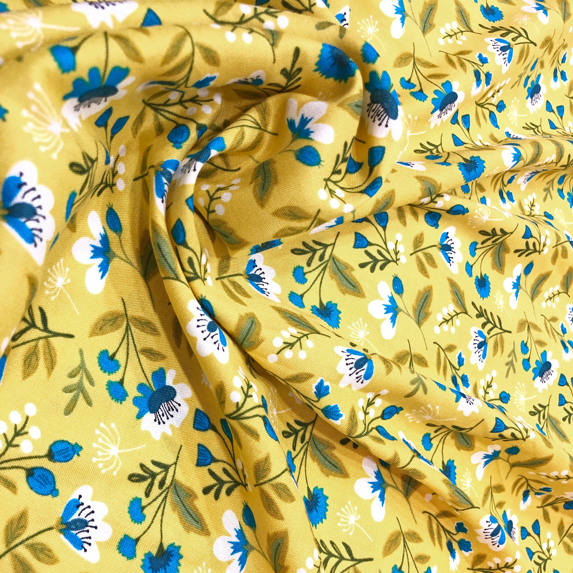 yellow rayon summer fabric.